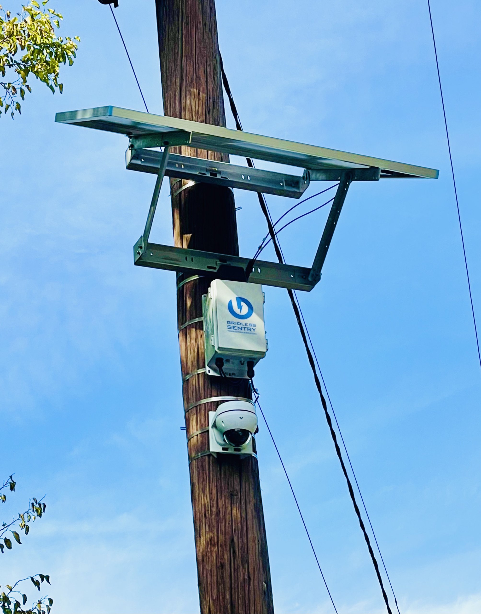 Gridless Sentry, Solar Panel, and Camera Installed on a Telephone Pole